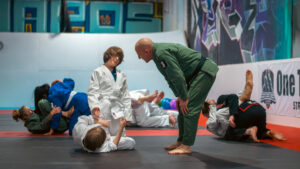 Brazilian Jiu Jitsu students training on the mats at Straight Blast Gym Calgary, showing the value of BJJ classes in Calgary.