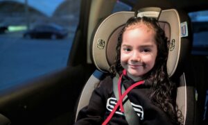 Parent talking with their child after a Brazilian Jiu Jitsu class at Straight Blast Gym Calgary, asking questions about what they learned on the mats.