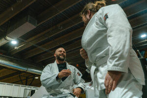Adult beginners training Brazilian jiu-jitsu at Straight Blast Gym Calgary