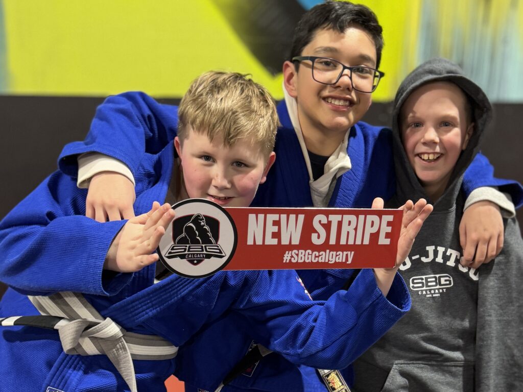 Confidence grows in a beginner-friendly kids Brazilian Jiu-Jitsu class at SBG Calgary
