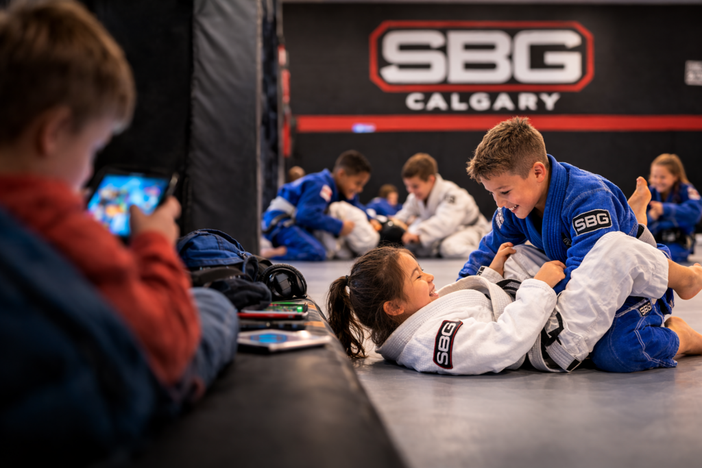 Children practicing Brazilian Jiu-Jitsu during a class at Straight Blast Gym Calgary as a healthy alternative to too much screen time